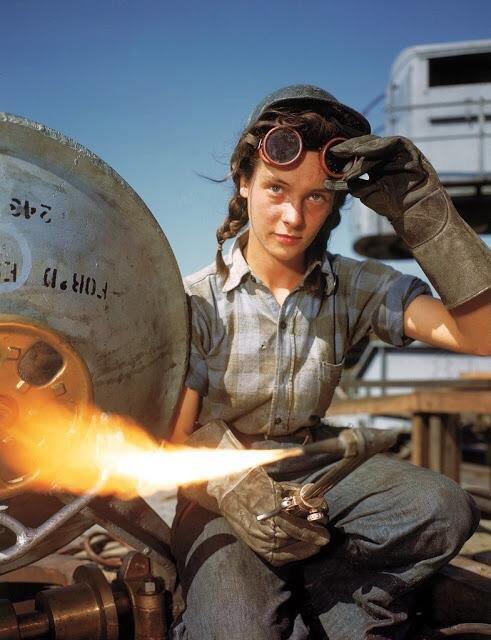 A Hot Welder At A Boat And Sub Building Yard Adjusts Her Goggles Before Resuming Work October 1943 NSF