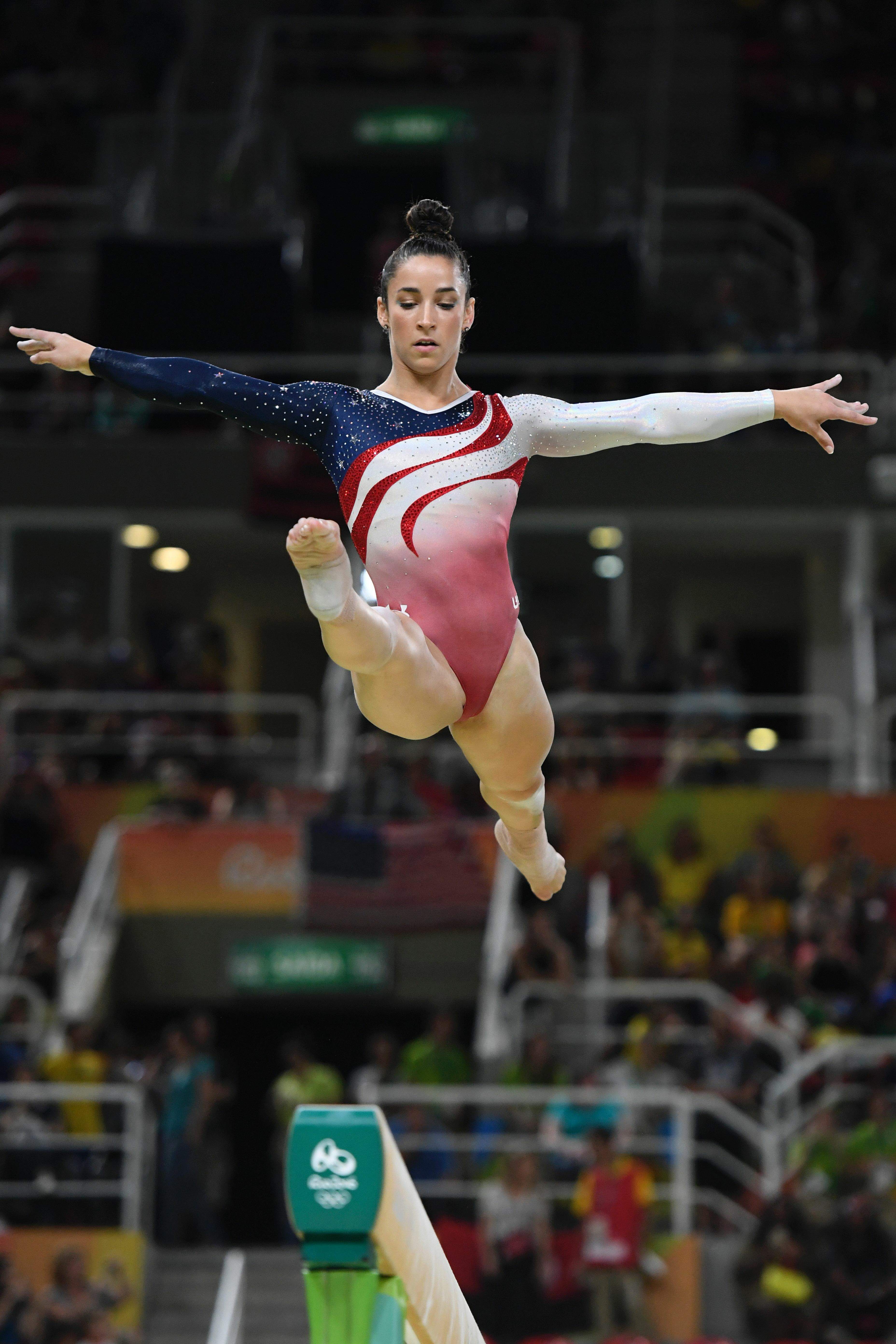 Artistic Gymnast Aly Raisman On The Balance Bea