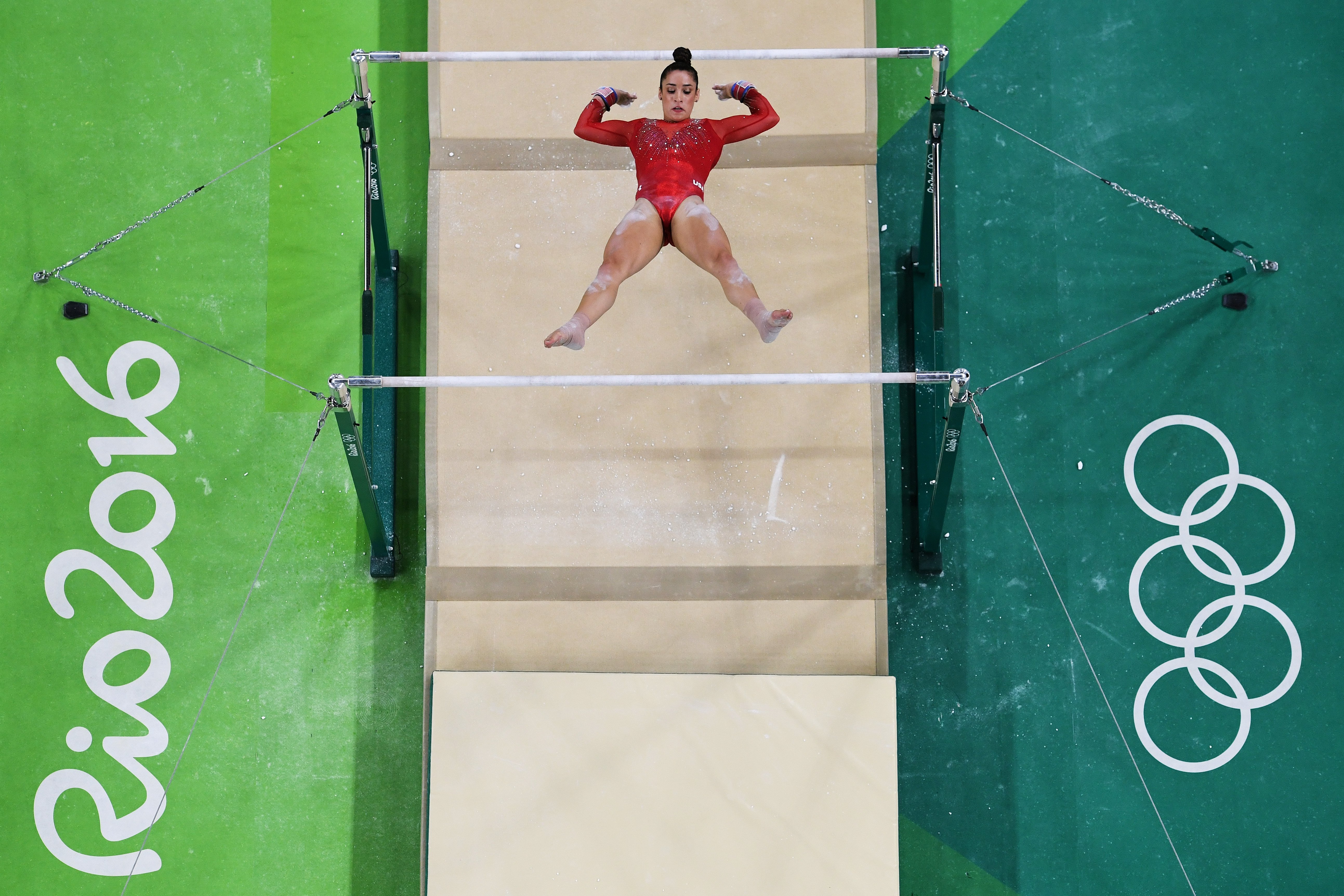 Gymnast Aly Raisman On The Uneven Bar