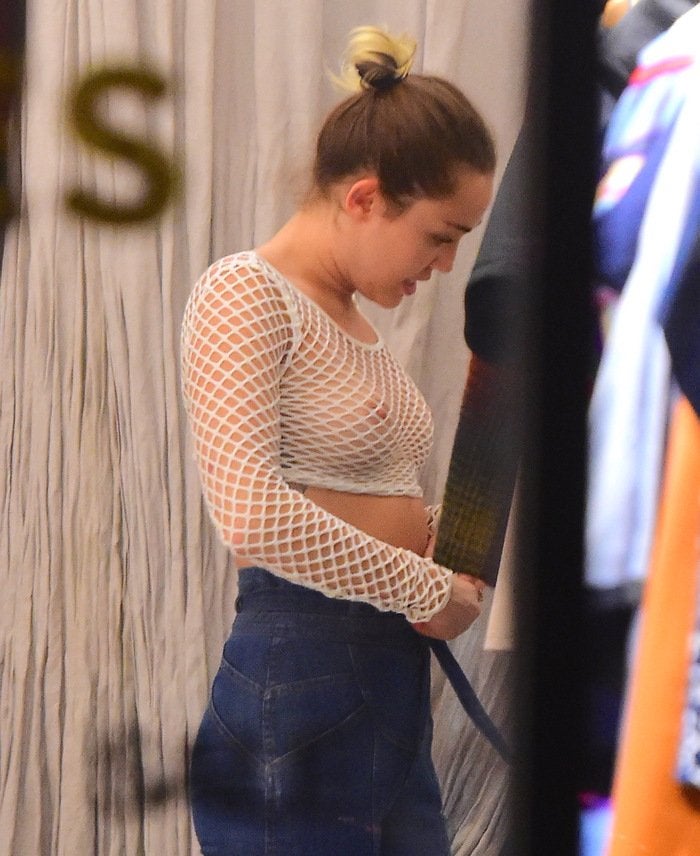 If You Look Closely Youll See That Miley Cyrus Is Braless Once Again NSFW