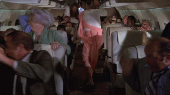 Kitten Natividad Breasts Scene In Airplane NSFW