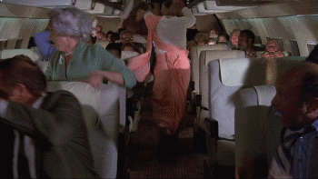 Kitten Natividad Breasts Scene In Airplane NSFW