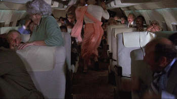 Kitten Natividad Breasts Scene In Airplane NSFW