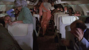 Kitten Natividad Breasts Scene In Airplane NSFW