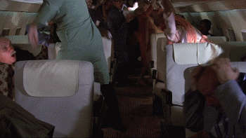 Kitten Natividad Breasts Scene In Airplane NSFW