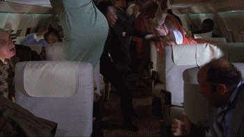 Kitten Natividad Breasts Scene In Airplane NSFW