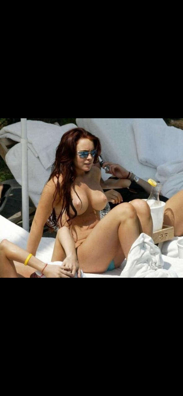 Lindsay Lohan Topless At The Beach NSF